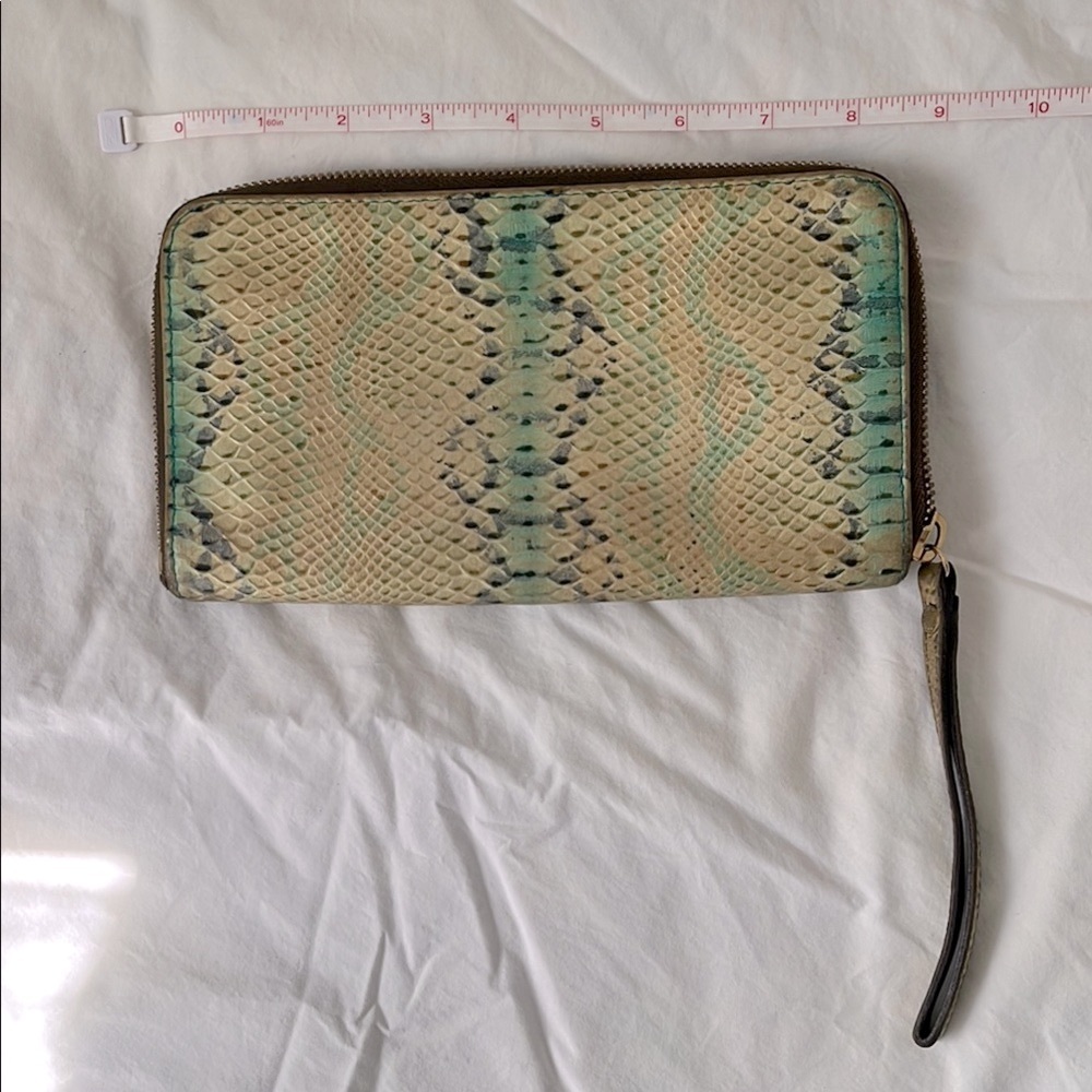 Longchamp faux python wristlet wallet.